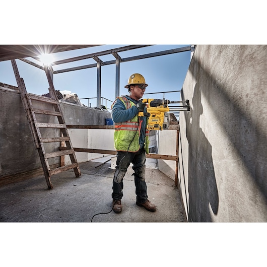 Profile of SDS Plus rotary hammer being used by person