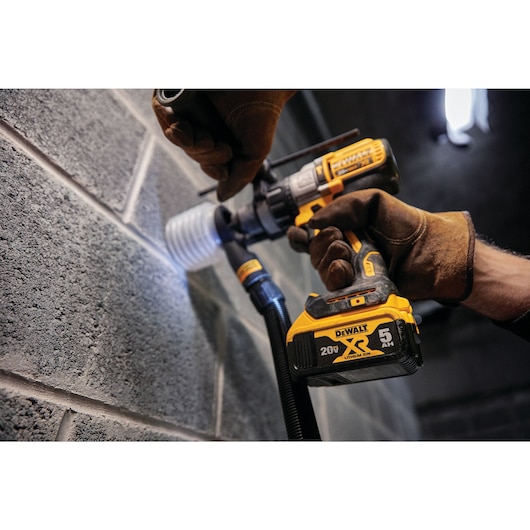 20 Volt 5 AMP hours Battery-powered Drill drilling a hole