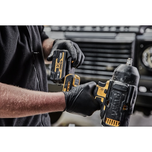 Putting gas filled nylon battery on the DEWALT DCF900 Impact Wrench