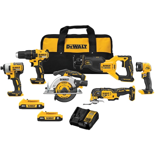 Six DEWALT power tools, bag, charger, and two batteries on a white background.

