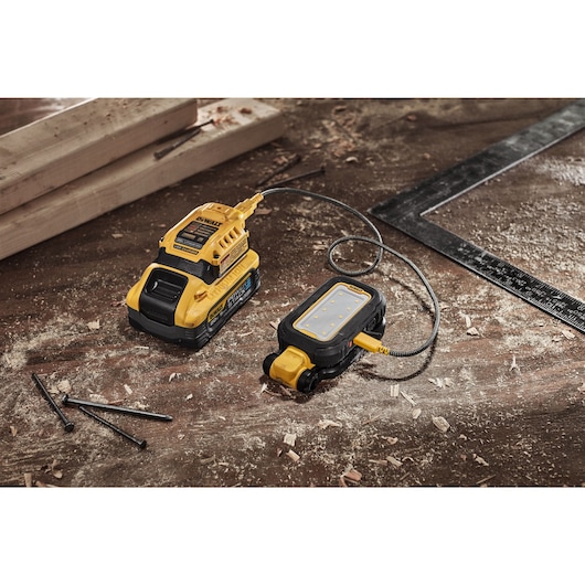 DEWALT task light charging using the DCB094K DART charger that has DCBP042 POWERSTACK™ compact battery 