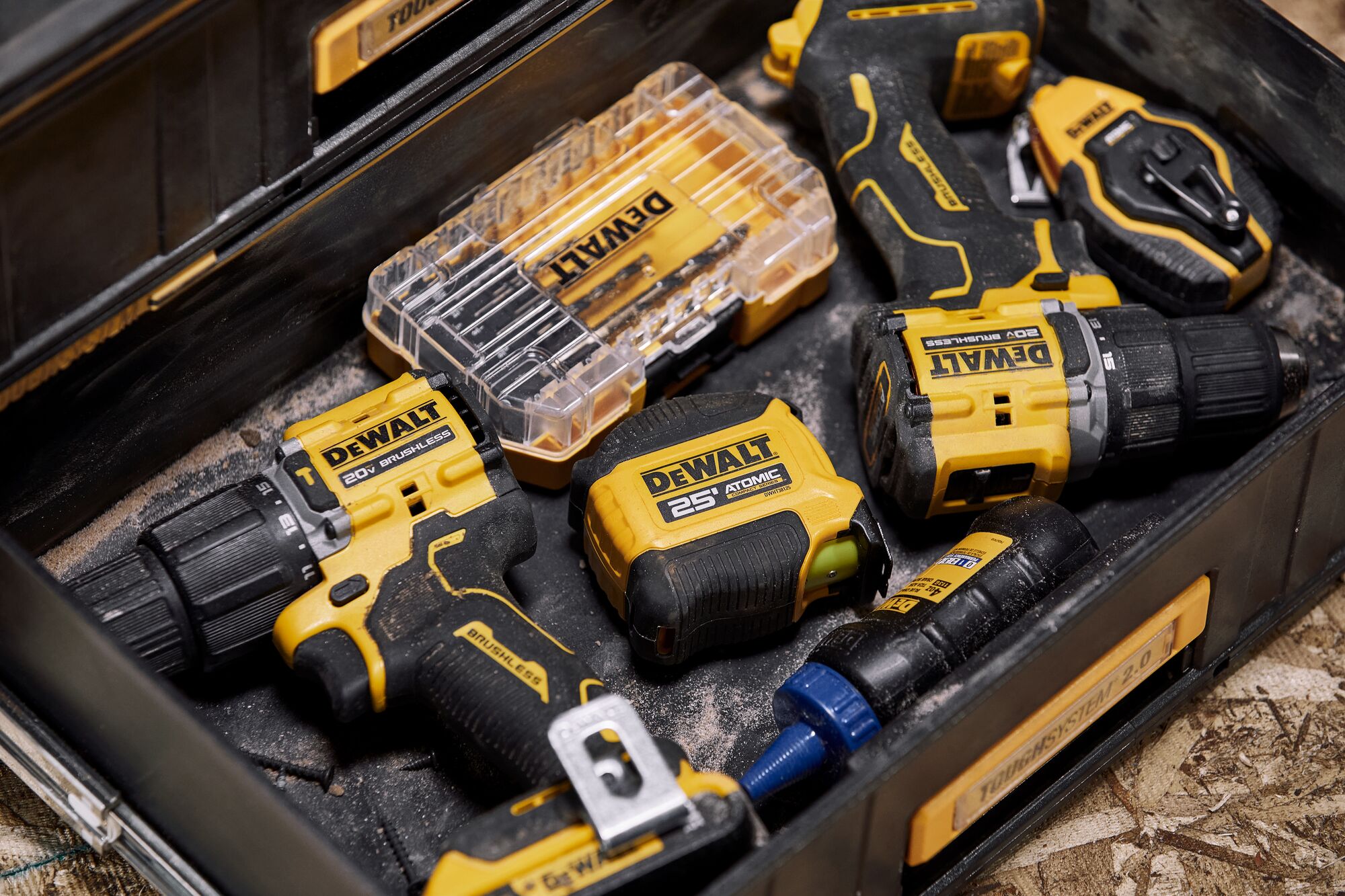 Group shot of 20V MAX drills with Tough System(®) tool box and ATOMIC tape measure close up