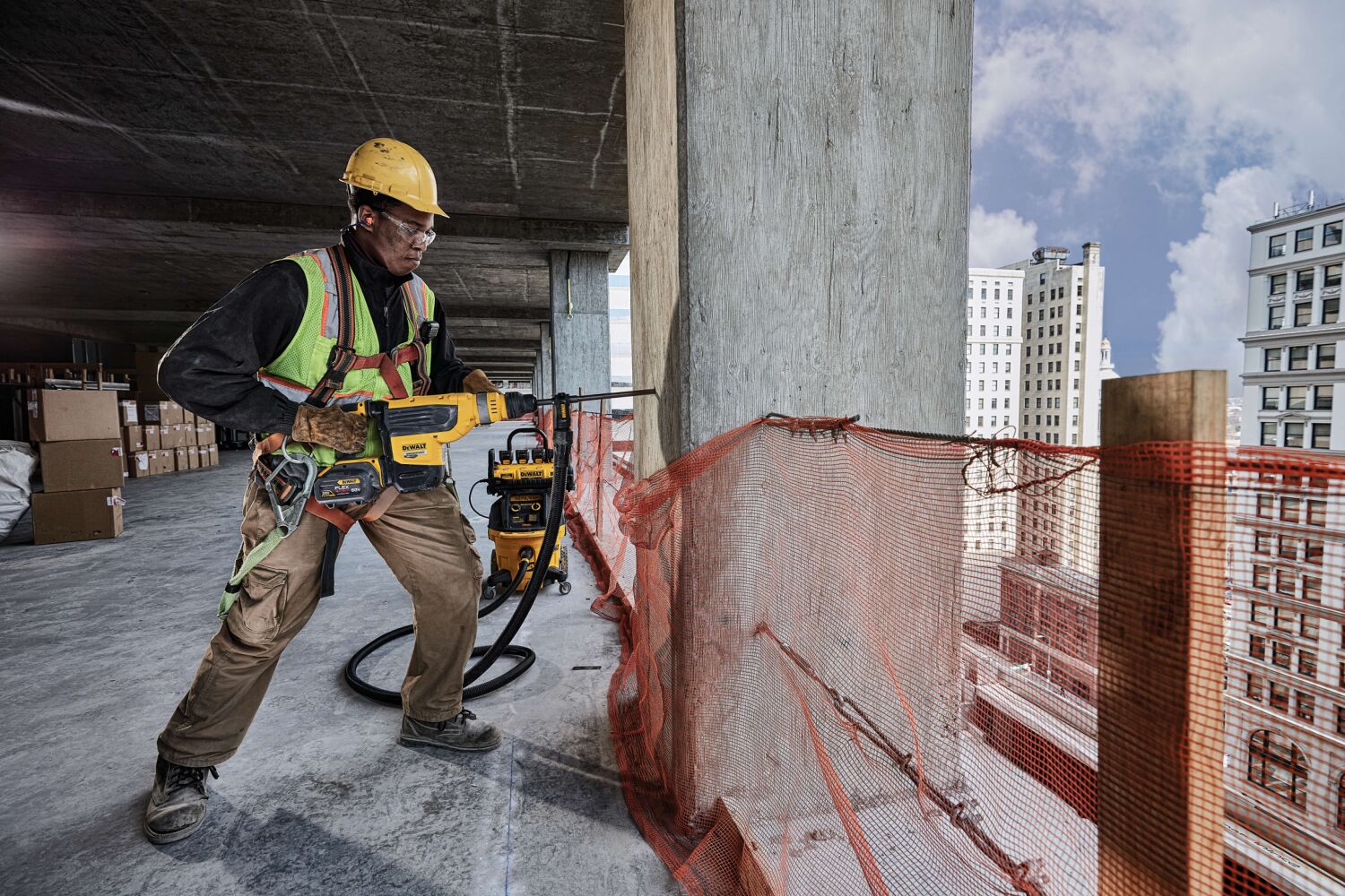 Brushless, cordless SDS MAX combination rotary hammer being used by a person