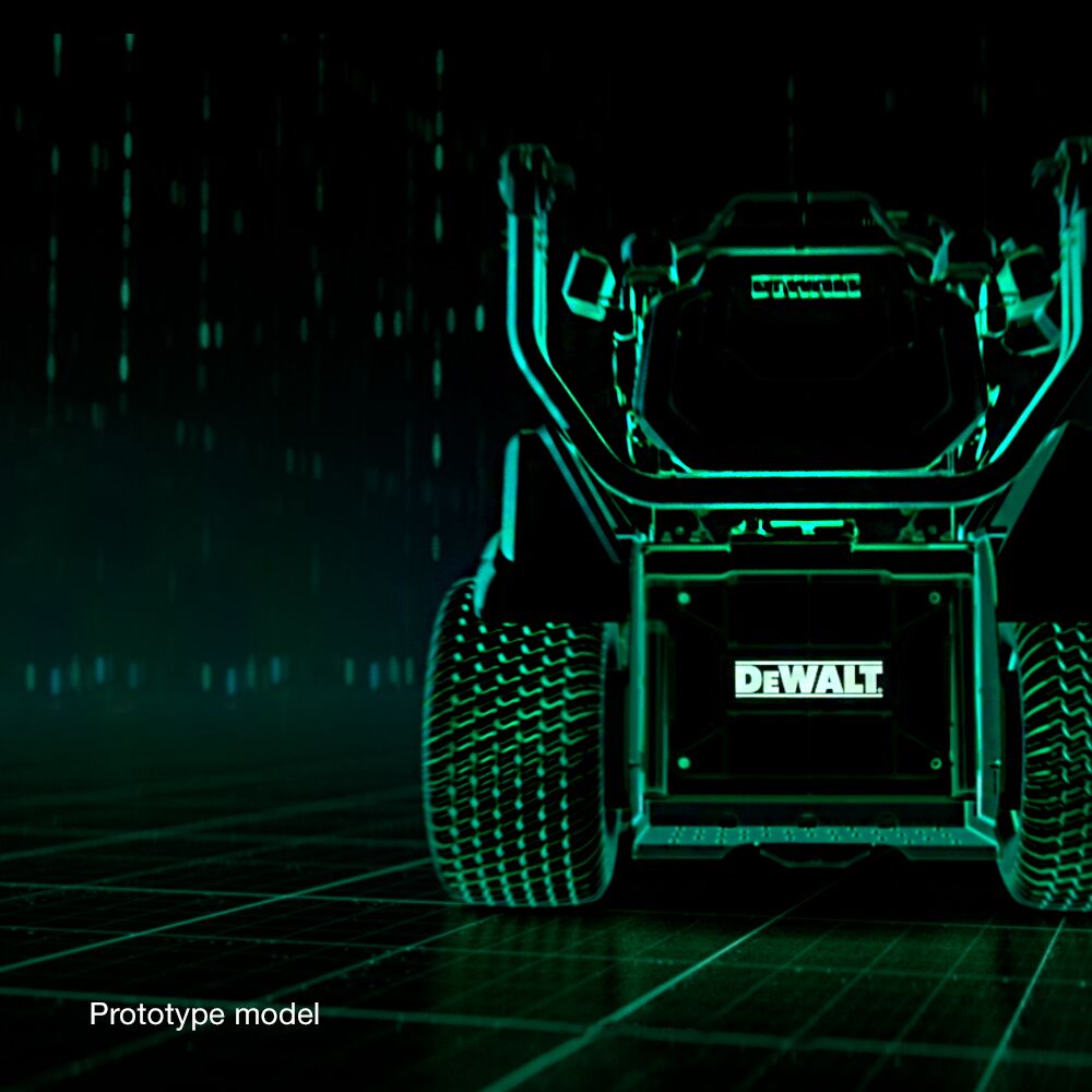 Up close shot of the back of the DeWALT Ascent electric professional mower in green lighting